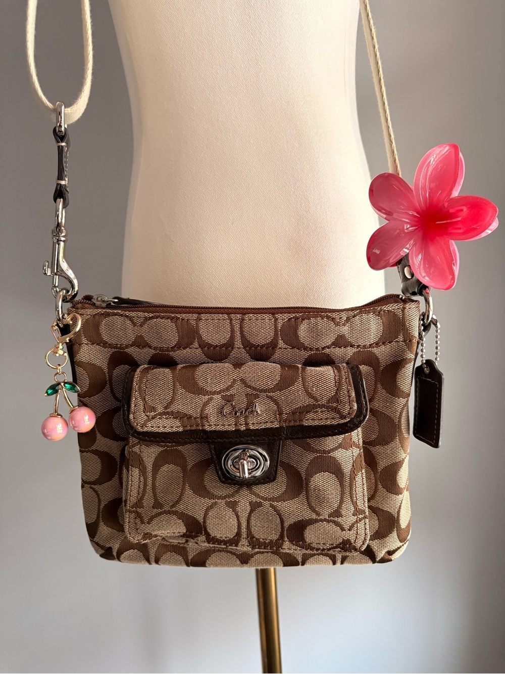 Coach Brown Signature Canvas Swingpack Crossbody with Front Pocket